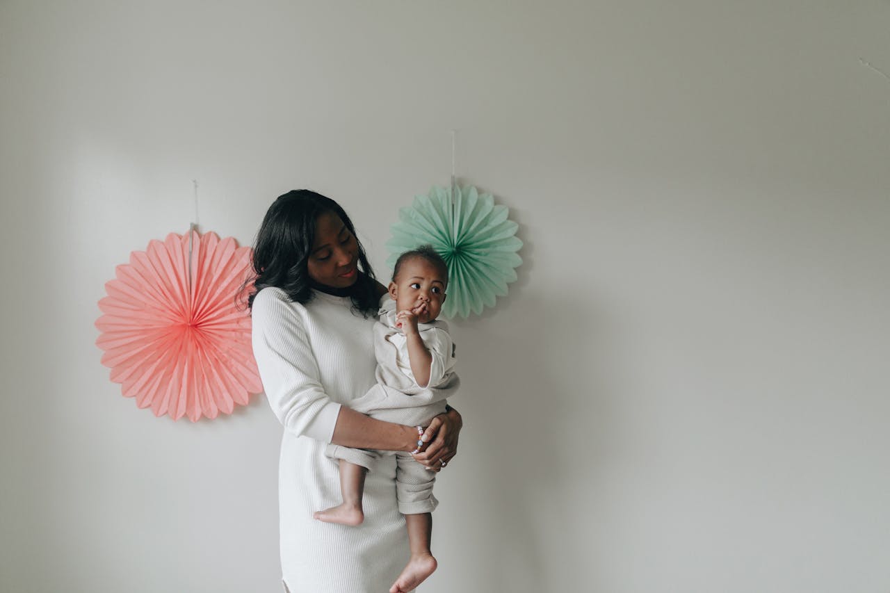 Mother Holding in Arms Baby